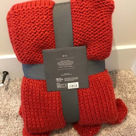 Chunky Knit Throw Blanket with Pom-Poms
Red - Threshold - Picture 2 of 2